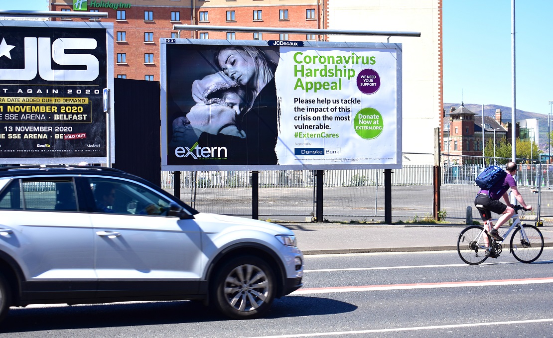 Image shows a large billboard ad for Extern's Coronavirus Hardship Appeal, supported by Danske Bank.