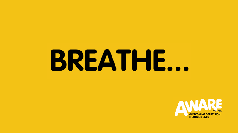 A yellow background, with black text in the middle reading 'BREATHE...'. There is a white AWARE logo to the bottom right.