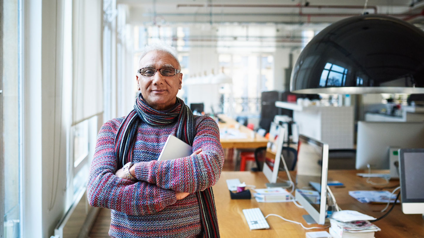 Man standing in office Man standing in office