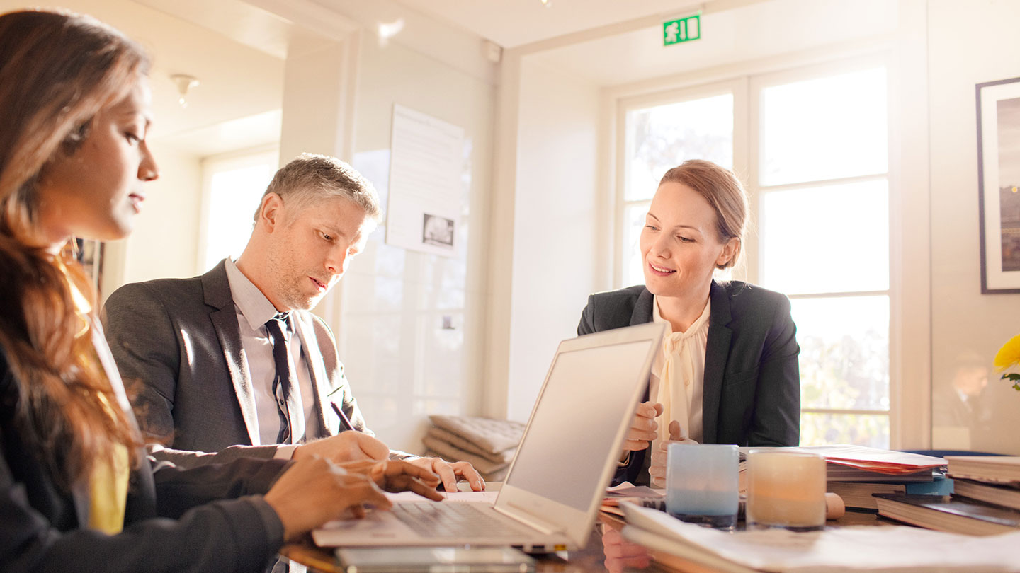Group of business people in an office Group of business people in an office