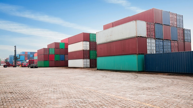 Cargo containers sitting in docks Cargo containers sitting in docks