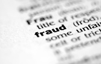 Fraud definition image A yellow background, with a graphic of a hand in a stop position. Text reads 'Take Five to stop fraud'.