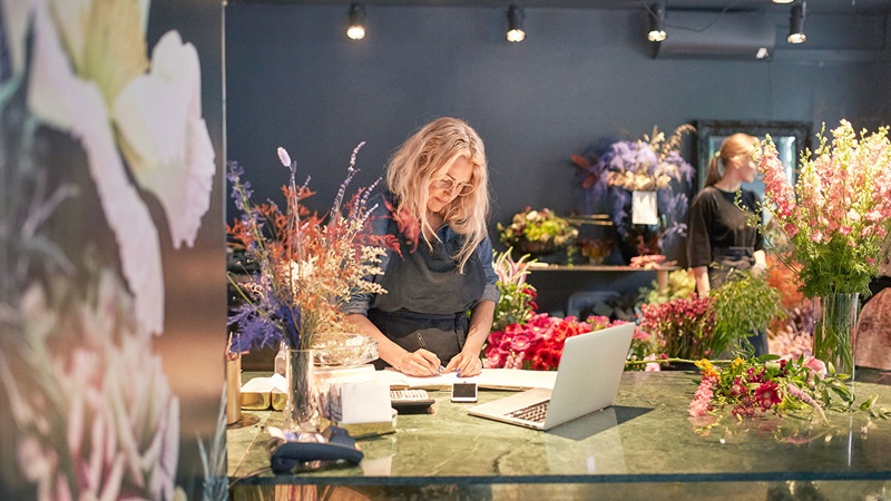 woman working in florists woman working in florists