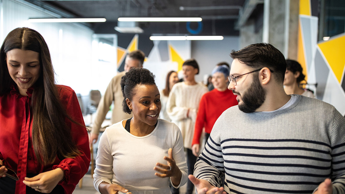 Young colleagues chatting