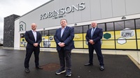 Ballymena supermarket invests £4million to double in size with support from Danske Bank Three men stand outside the newly extended Robinsons shop in Ballymena.