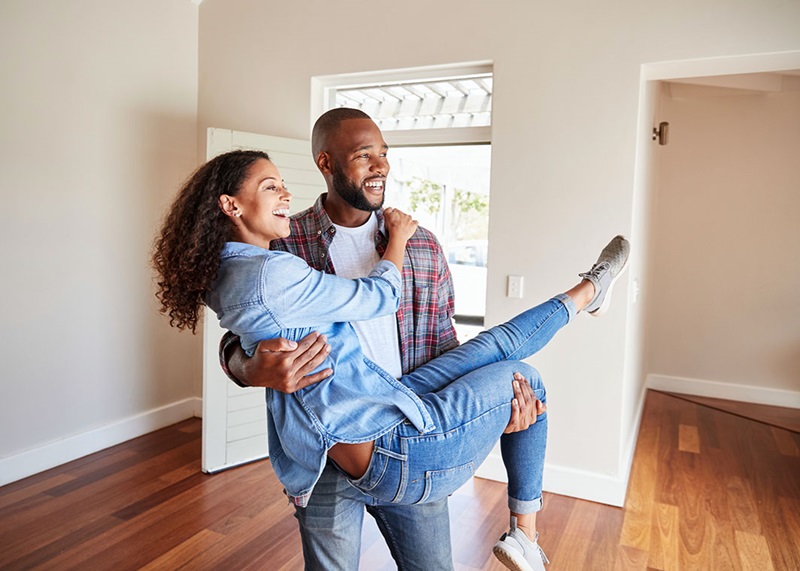 Happy couple in new home